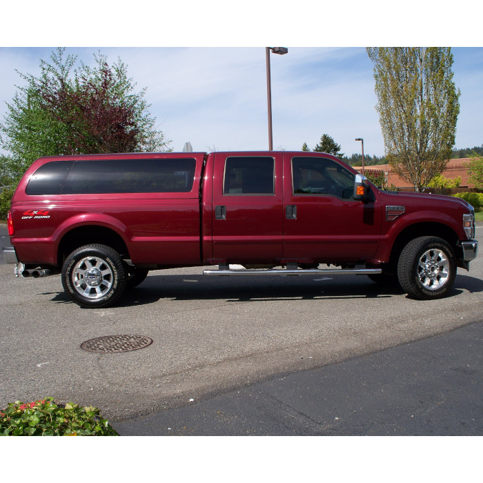 Full size Ford F250 with tinted windows and matching canopy